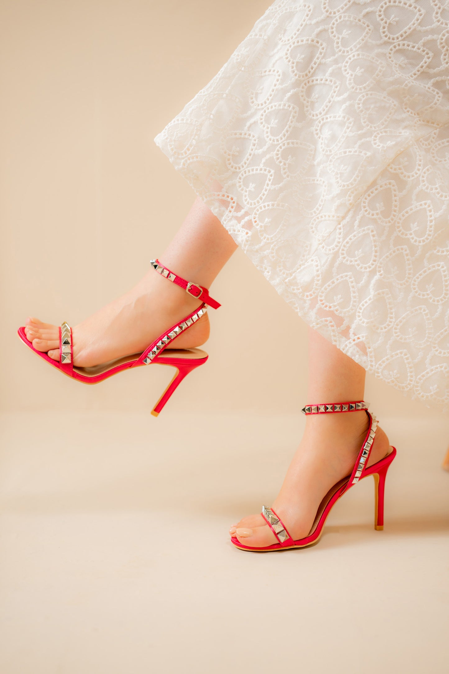Ankle-cuff studded heels