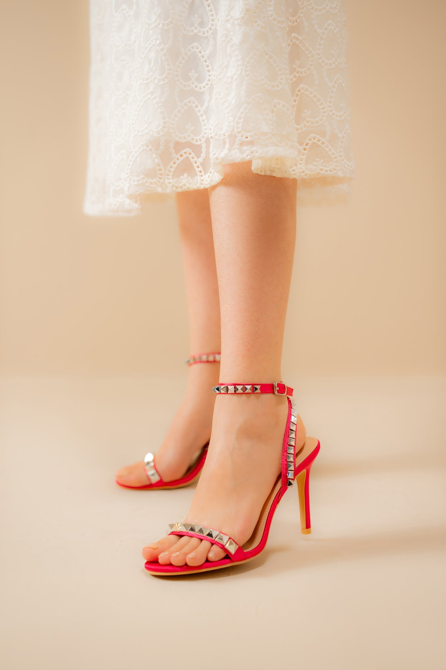 Ankle-cuff studded heels
