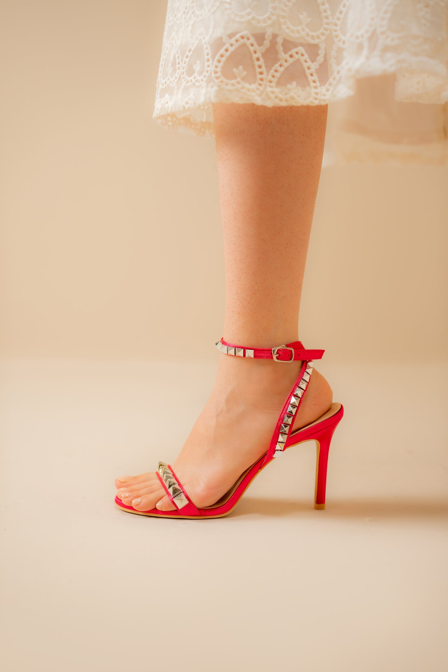 Ankle-cuff studded heels