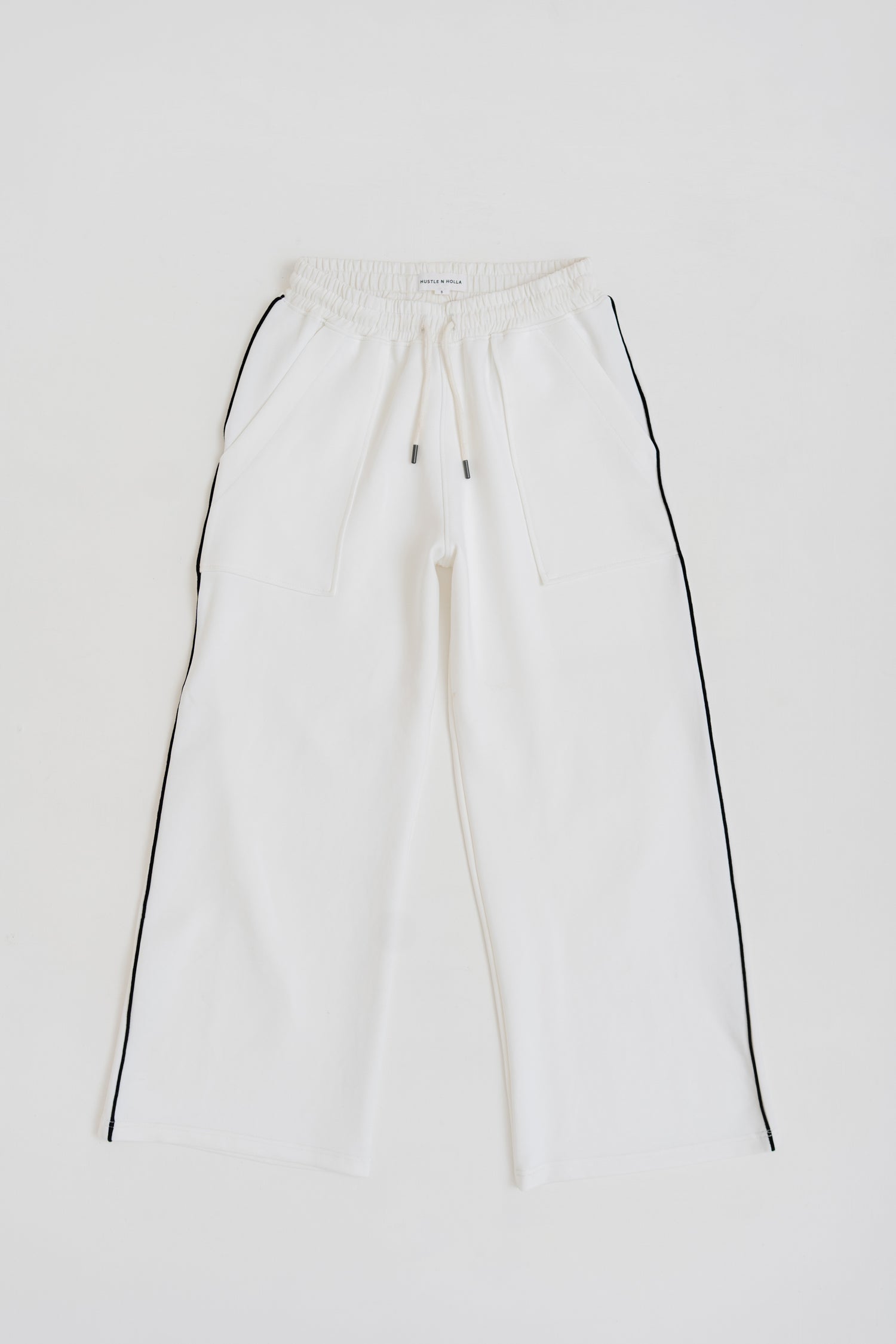 WHITE KNITTED WIDE LEG PANTS WITH CONTRASTING PIPING