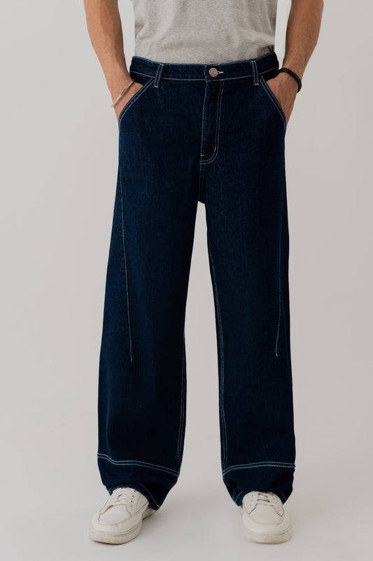 INDIGO WASH CUT & SEW BAGGY FIT JEANS - Hustle N Holla