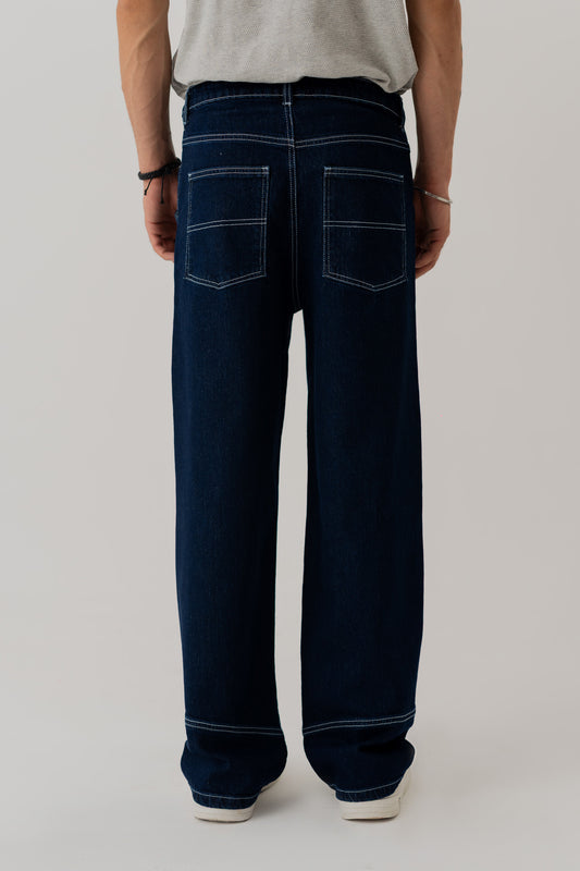INDIGO WASH CUT & SEW BAGGY FIT JEANS - Hustle N Holla