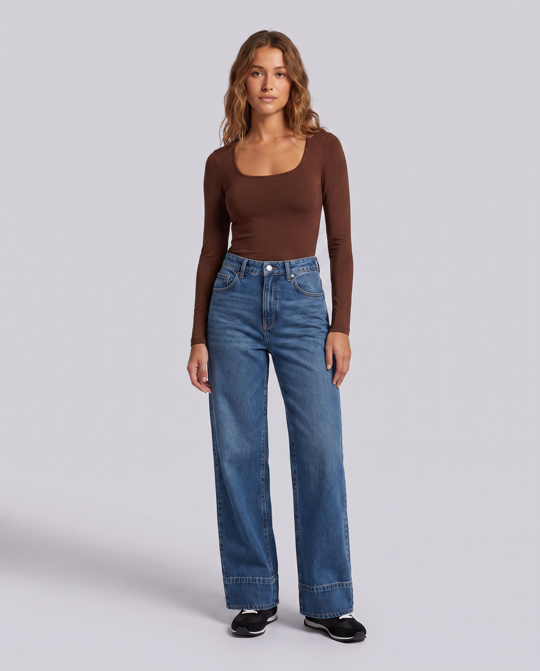 Blue Relaxed Fit Mid Wash Denim Jeans - front view on model