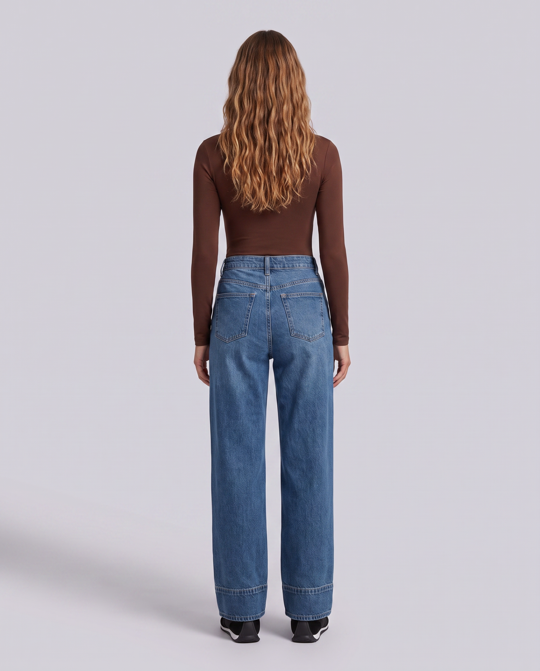 Blue Relaxed Fit Mid Wash Denim Jeans - front view on model